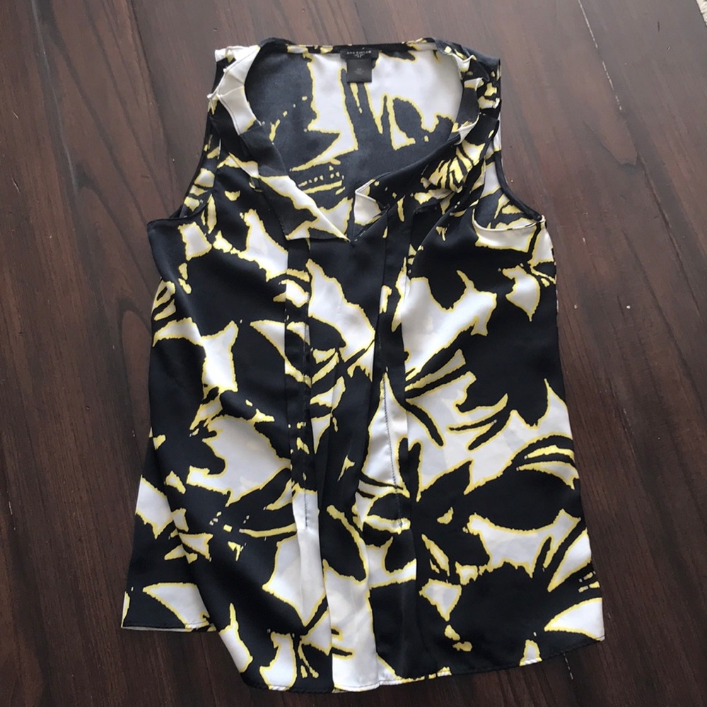 Black, yellow, and white loose fitting blouse